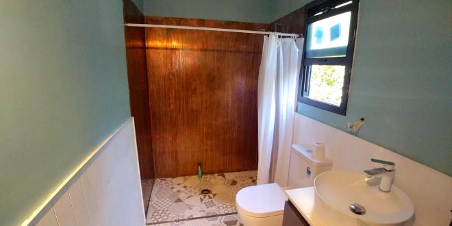 oxidised copper and a functional shower
